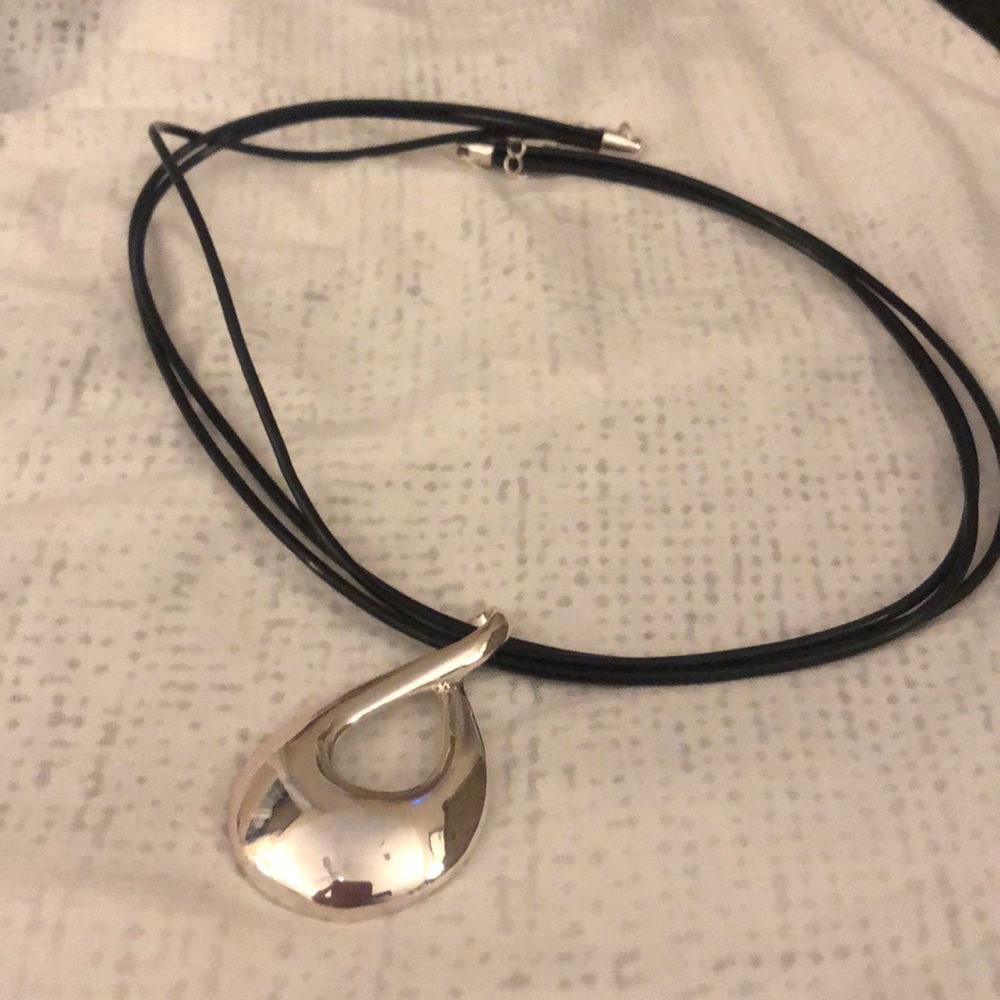 Silver slide on black leather necklace